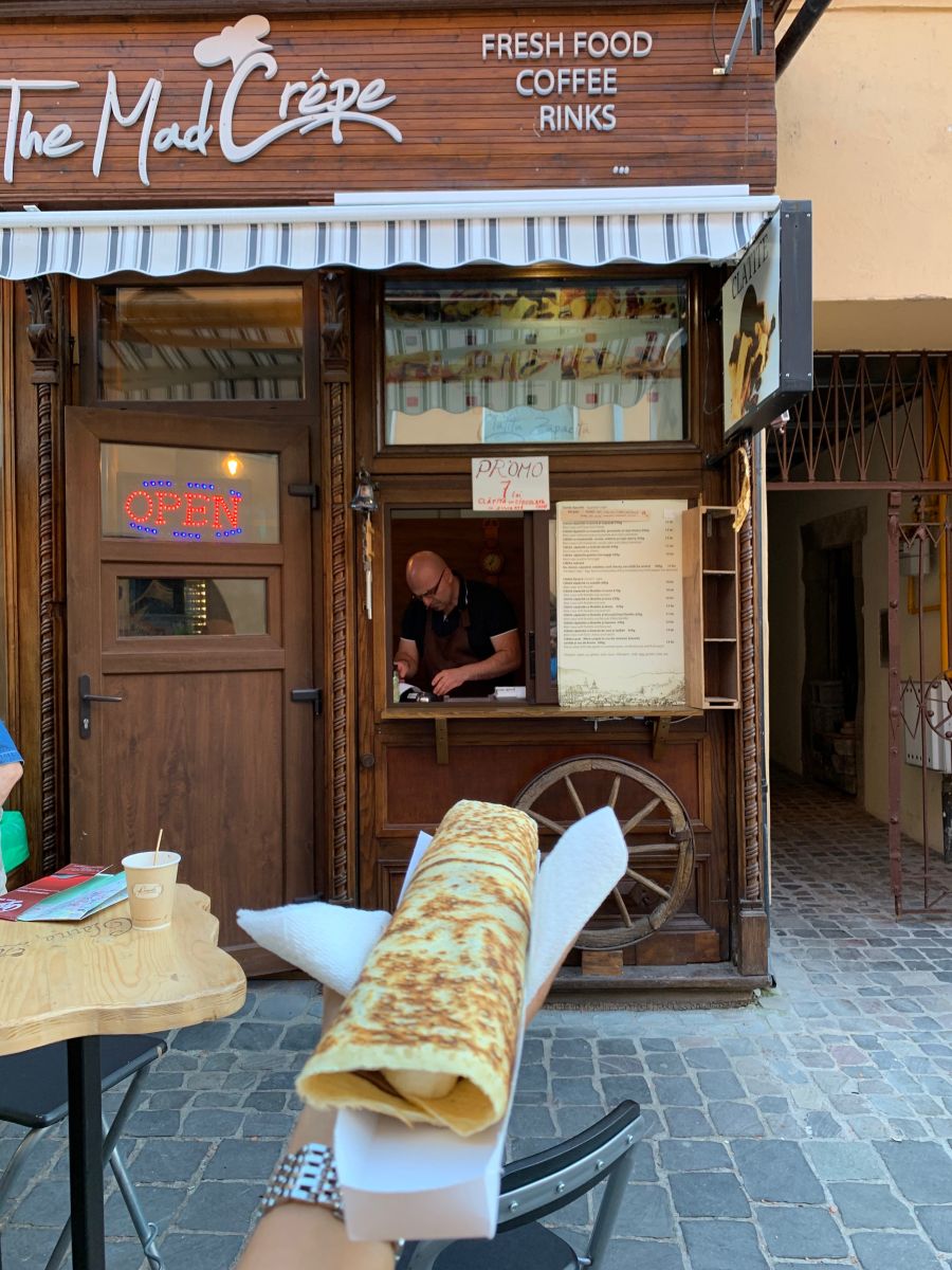 Enjoying Crêpe at Brasov Romania Enjoying Crêpe at Brasov Romania